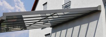 Fechner Fenster- und Türenbau Gaschwitz GmbH in Markkleeberg, Hochwertige Hofüberdachung aus Edelstahl und Glas 